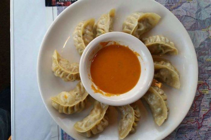 Nepali chicken momo served with spicy pickle. (Photo by Upakar Panday)