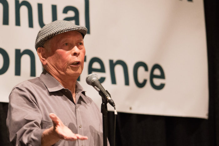 "Uncle Bob" Santos speaks at the 2015 Governing for Racial Equity (GRE) Conference, which took place on June 11 – 12, 2015, at the Washington State Convention Center in Seattle. (Photo by Ned Ahrens for King County via Flickr. Photo has been cropped.)