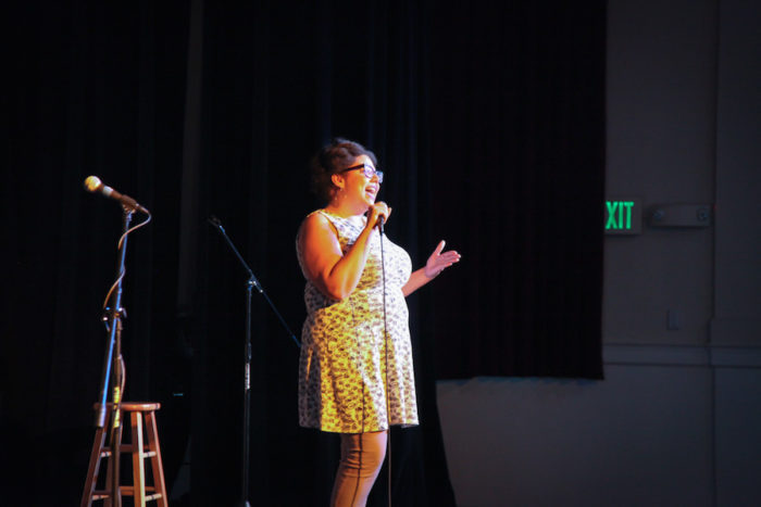 Jamila Johnson onstage at "Stories of Finding Home." (Photo by Alex Stonehill.)