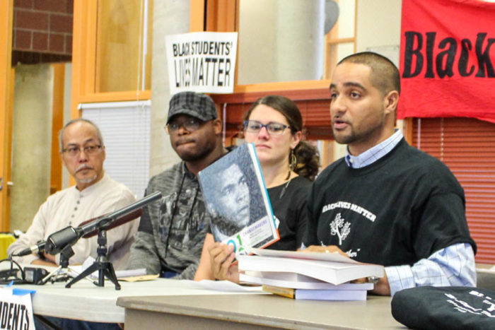 (Right) Garfield High School teacher Jesse Hagopian talks about Black Lives Matter curriculum at a press conference. Other teachers include (left to right) Rogelio Rigor, Donte Felder and Sarah Arvey. (Photo by Venice Buhain)