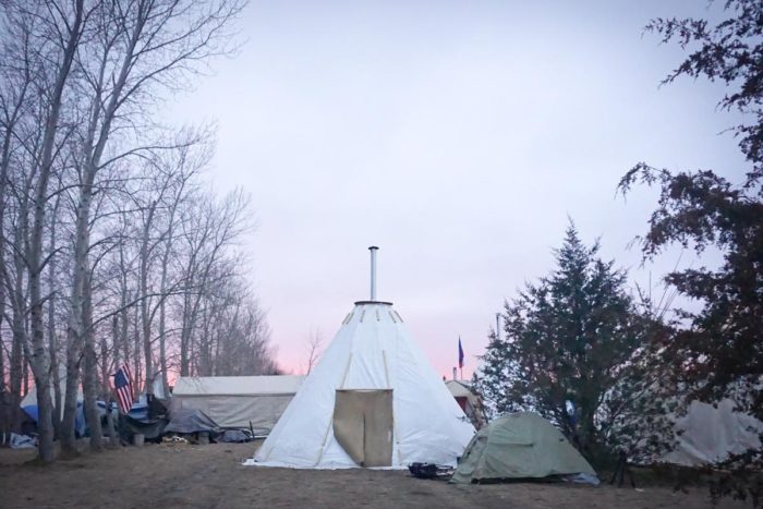 A tarpee in the Rosebud Camp at Standing Rock as night falls. (Photo by Agatha Pacheco)