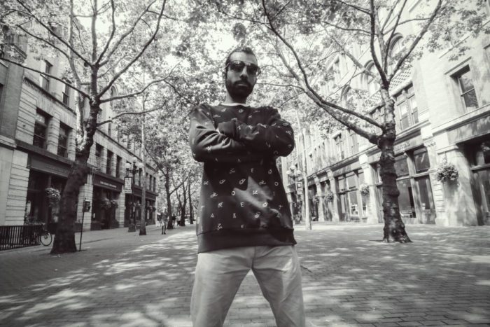 Jamil Suleman as himself, in Pioneer Square. (Photo by Carradin Michel)