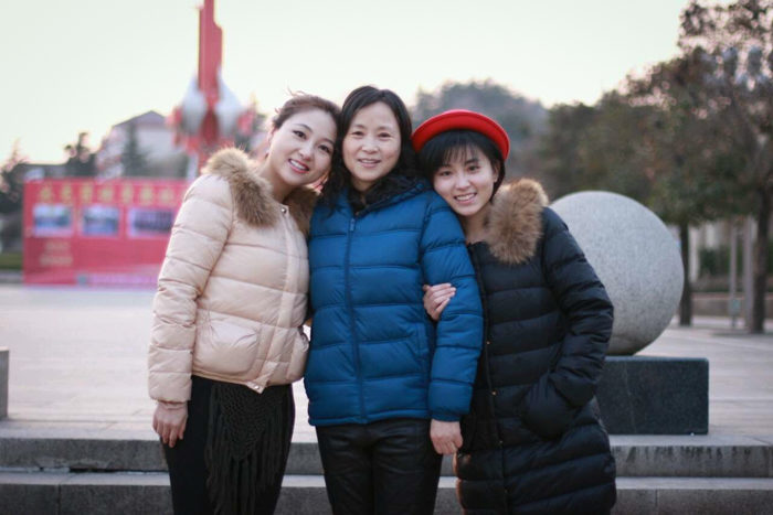 Ping Xu, left, with her mother and sister. (Courtesy photo)