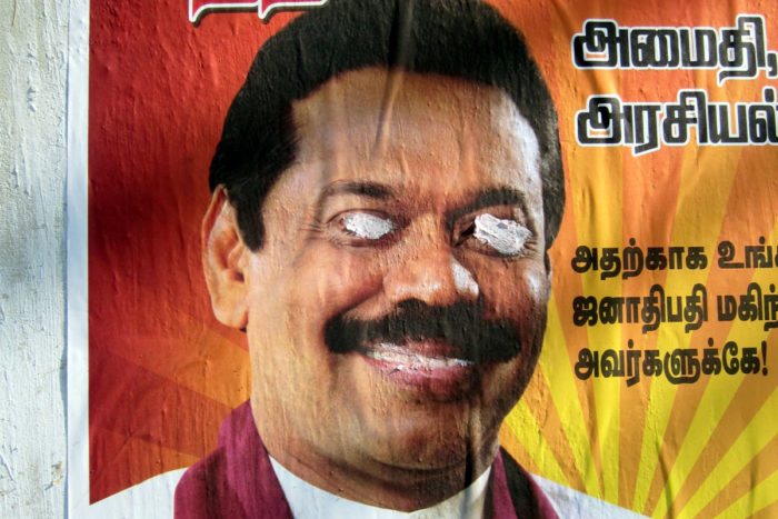 Campaign posters of Mahinda Rajapaksa with the eyes scratched out. (Photo by Indi Samarajiva)